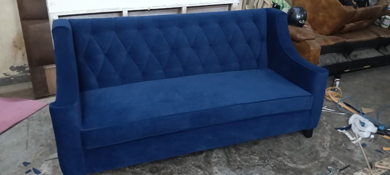 Grey channel tufted L-shaped sofa with piping finished in Ghaziabad